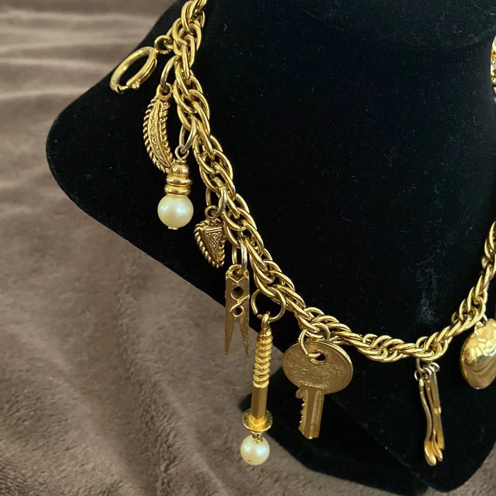 Vintage 1980s Rare Moschino Redwall 15 iconic brand gold charm necklace